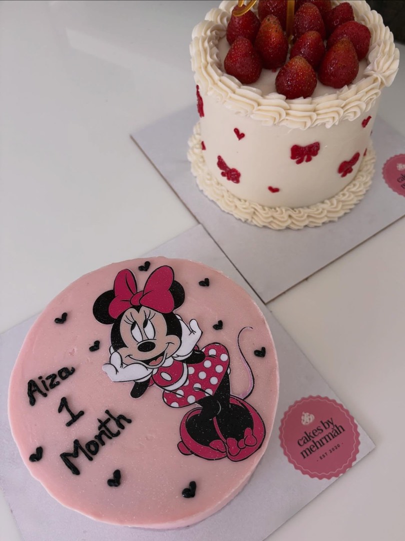 Pink Minnie Mouse first-month celebration cake